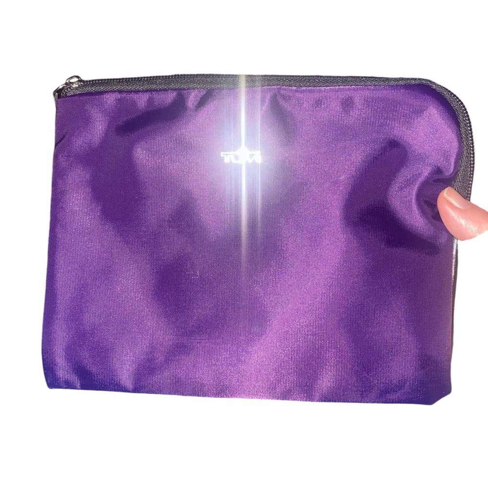 Tumi for delta travel purple bag